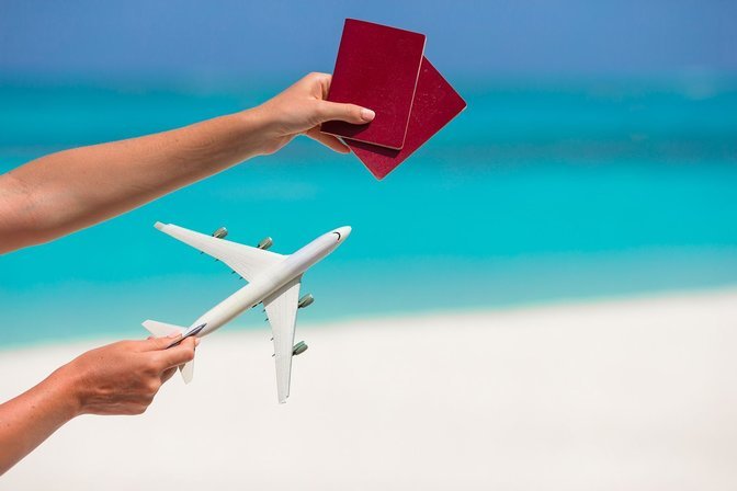 bigstock-Closeup-of-passports-and-white-88630385_result
